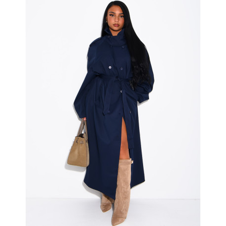 Long, oversized trench coat with a stand-up collar and a belt at the waist