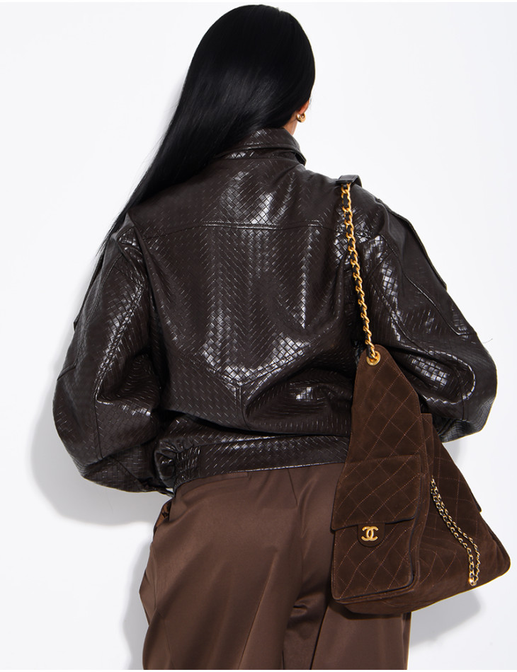 Oversized faux leather jacket with a braided look and a stand-up collar