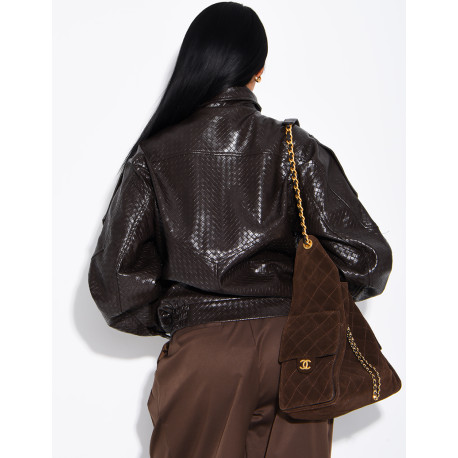 Oversized faux leather jacket with a braided look and a stand-up collar