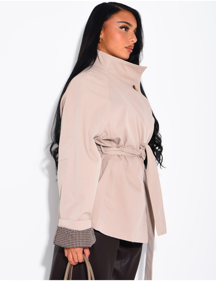 Mid-length belted trench coat with a stand-up collar, checked lapels and checked sleeves