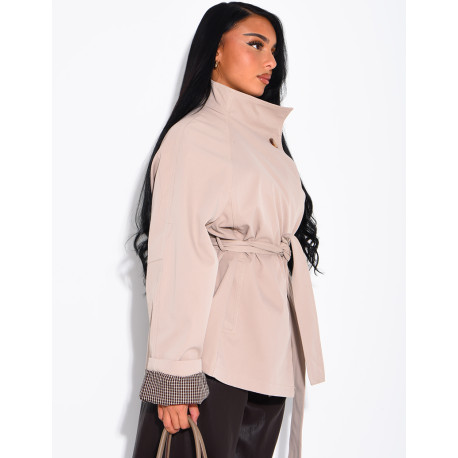 Mid-length belted trench coat with a stand-up collar, checked lapels and checked sleeves