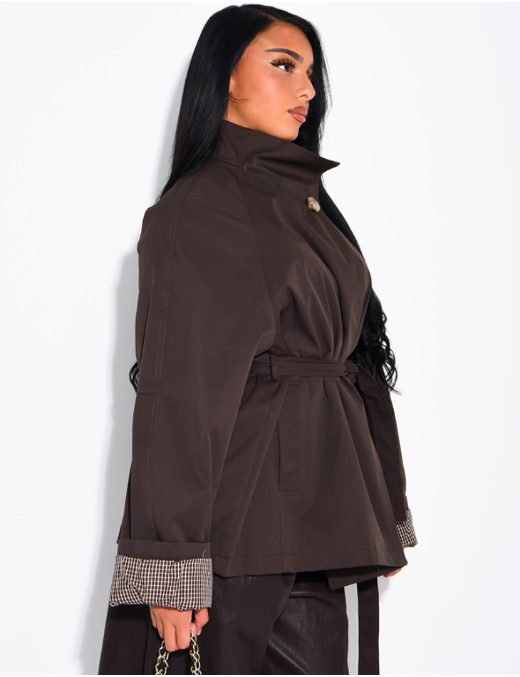 Mid-length belted trench coat with a stand-up collar, checked lapels and checked sleeves