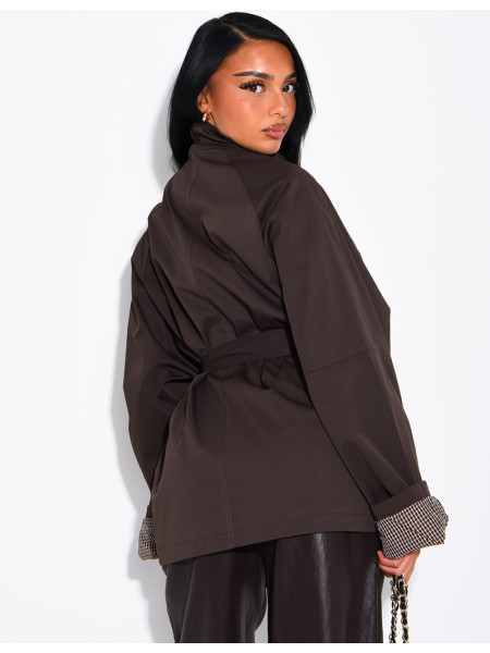 Mid-length belted trench coat with a stand-up collar, checked lapels and checked sleeves