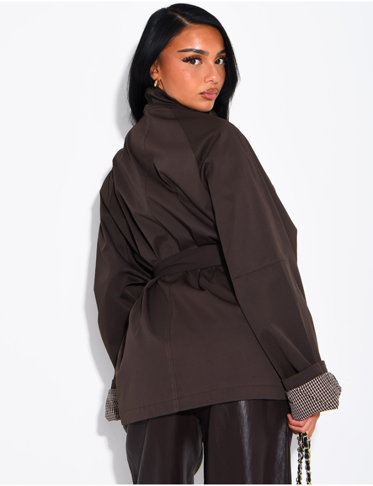 Mid-length belted trench coat with a stand-up collar, checked lapels and checked sleeves