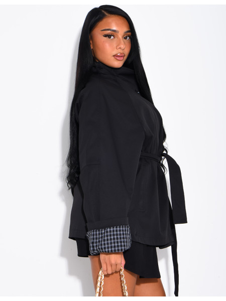 Mid-length belted trench coat with a stand-up collar, checked lapels and checked sleeves