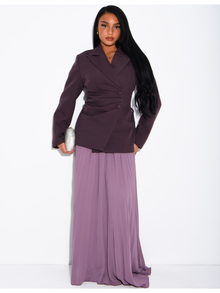 Blazer with an adjustable asymmetrical button placket in the back