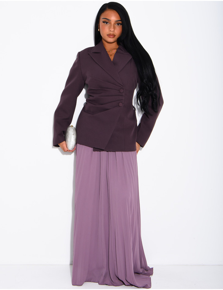 Blazer with an adjustable asymmetrical button placket in the back