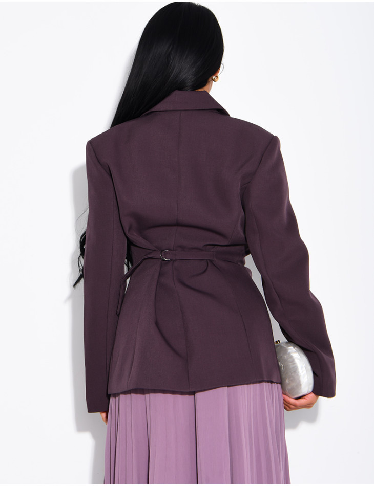 Blazer with an adjustable asymmetrical button placket in the back