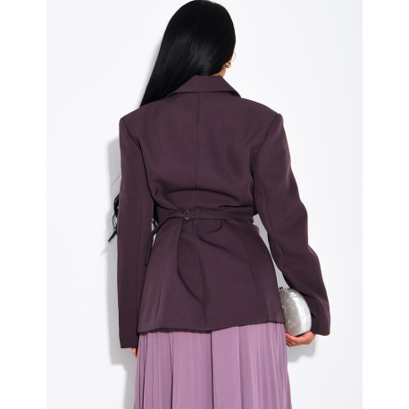 Blazer with an adjustable asymmetrical button placket in the back
