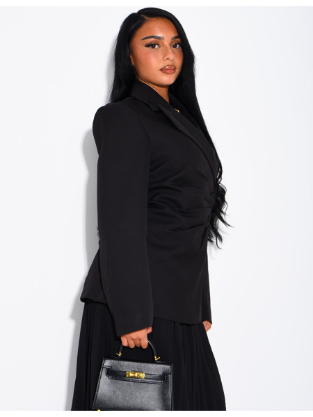 Blazer with an adjustable asymmetrical button placket in the back