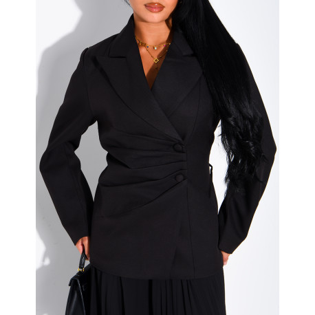Blazer with an adjustable asymmetrical button placket in the back