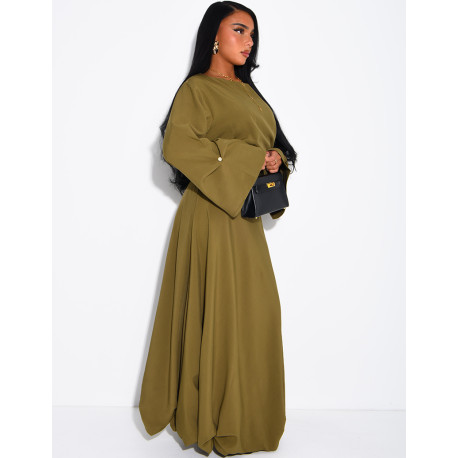 Long dress with a tie at the back and a puffed effect