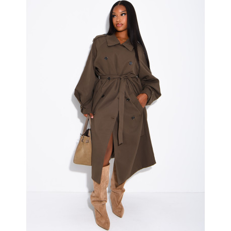 Long, oversized trench coat with a textured stand-up collar and a belt at the waist