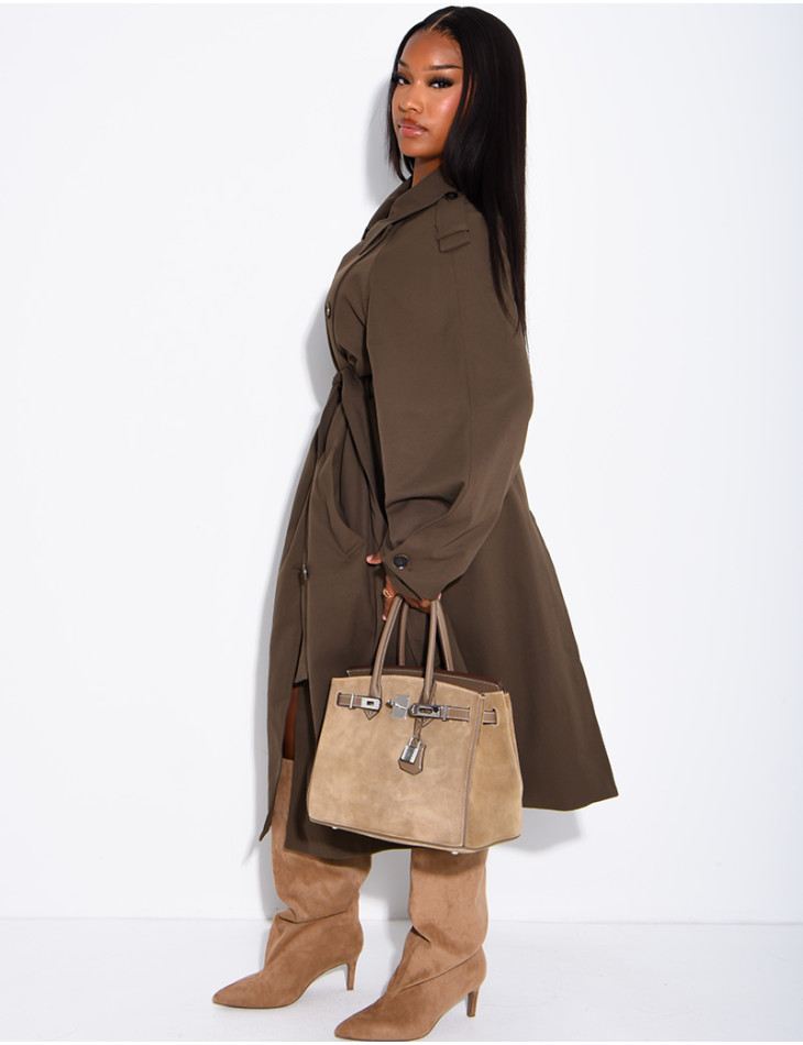 Long, oversized trench coat with a textured stand-up collar and a belt at the waist