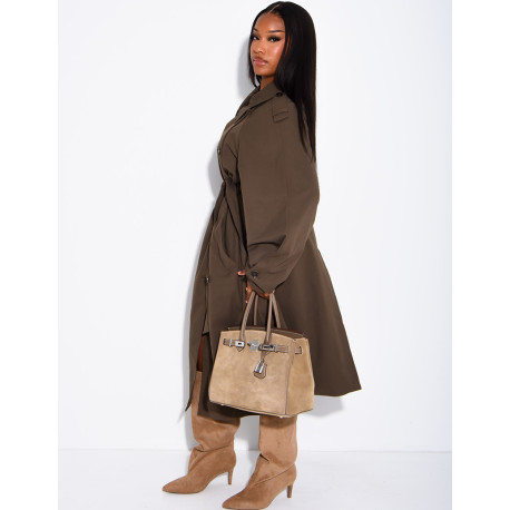 Long, oversized trench coat with a textured stand-up collar and a belt at the waist