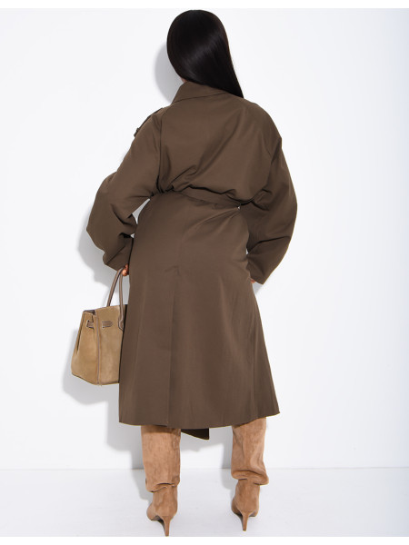 Long, oversized trench coat with a textured stand-up collar and a belt at the waist
