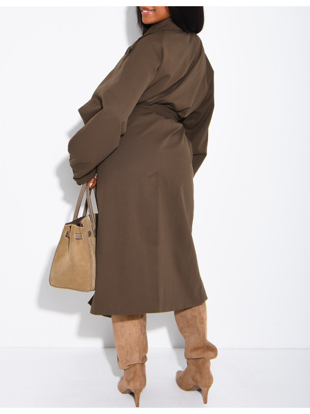 Long, oversized trench coat with a textured stand-up collar and a belt at the waist