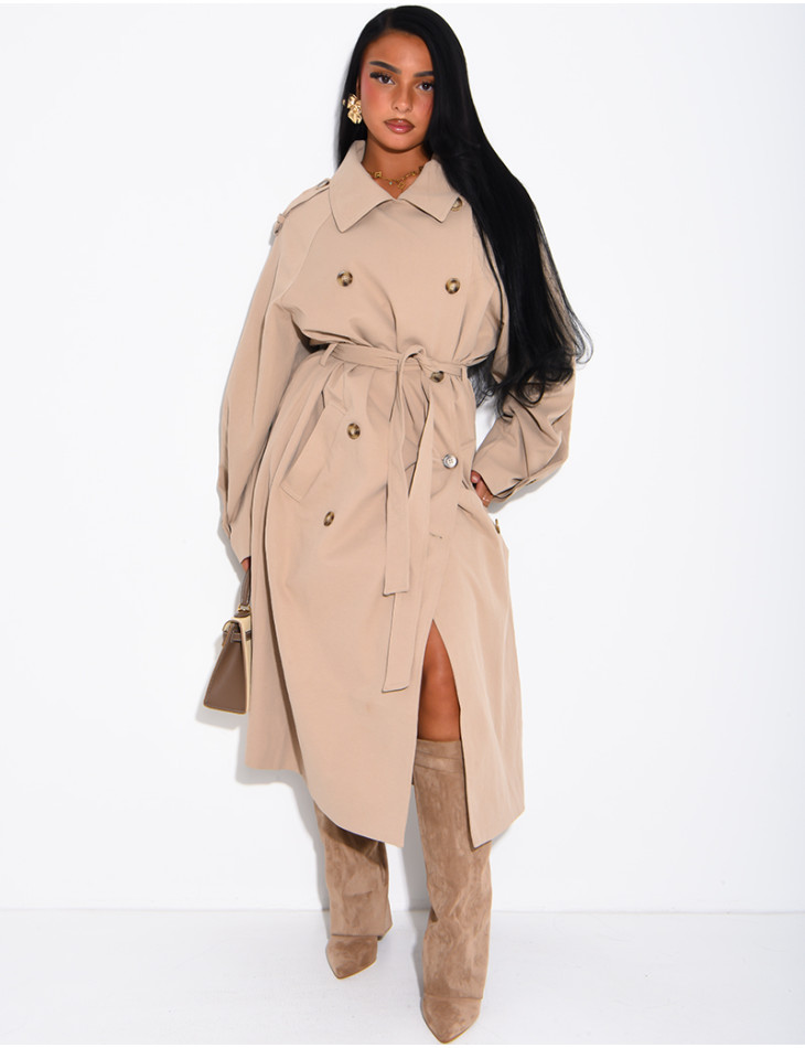 Long, oversized trench coat with a textured stand-up collar and a belt at the waist