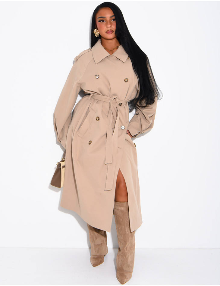 Long, oversized trench coat with a textured stand-up collar and a belt at the waist