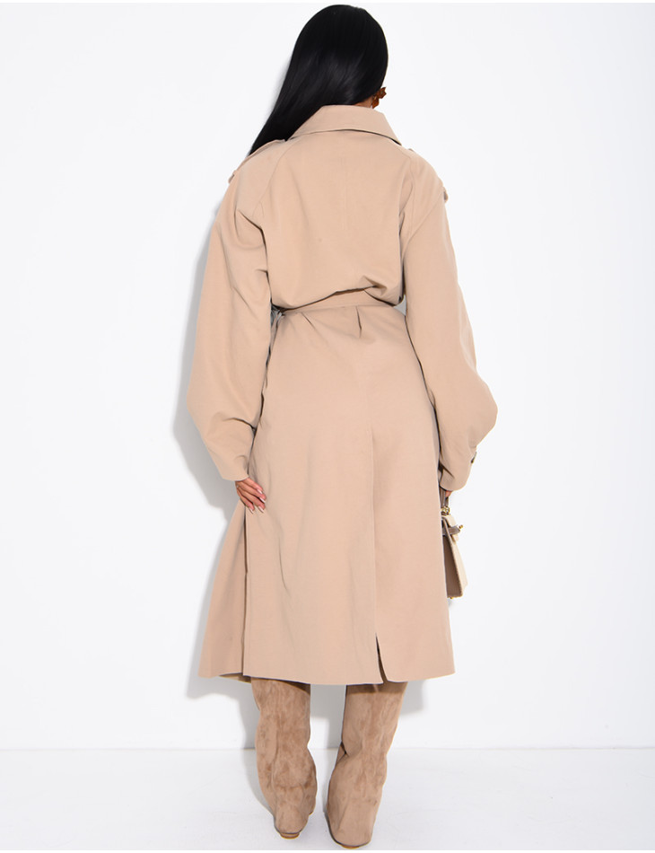 Long, oversized trench coat with a textured stand-up collar and a belt at the waist