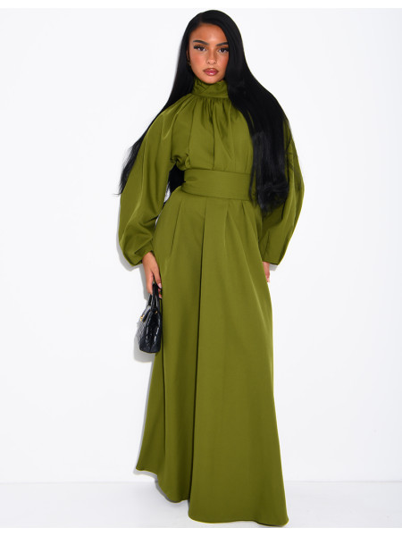Long dress with a high neck and a wide belt at the waist