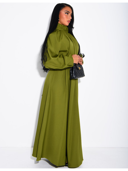 Long dress with a high neck and a wide belt at the waist