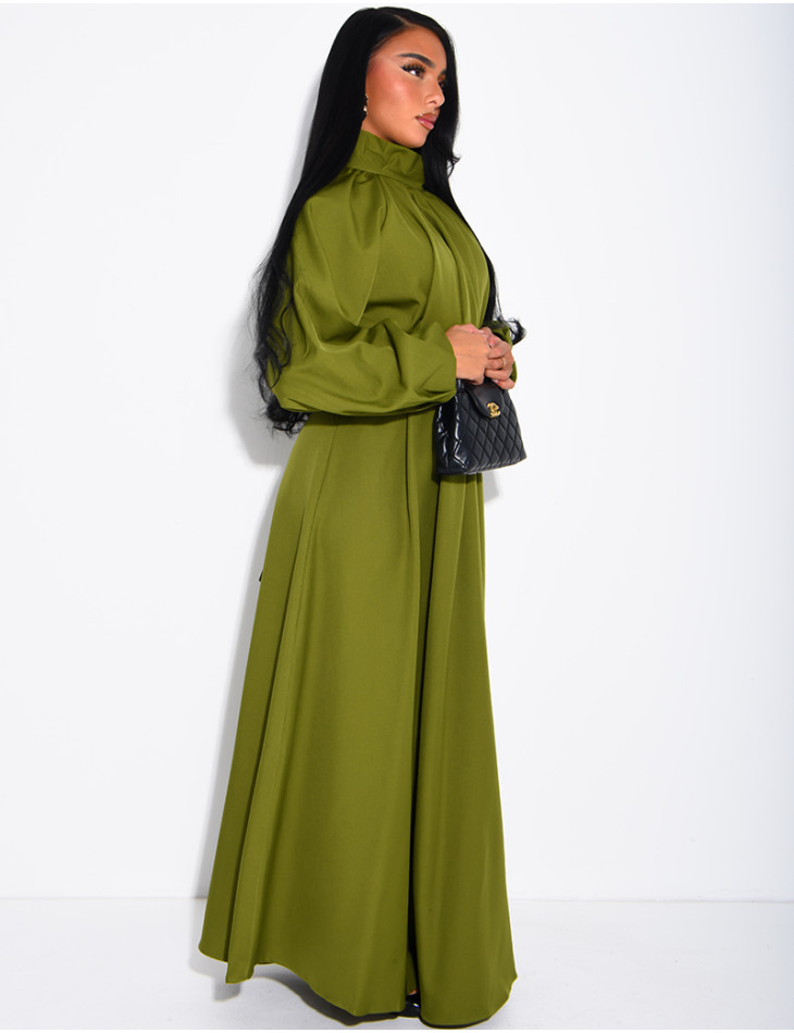 Long dress with a high neck and a wide belt at the waist