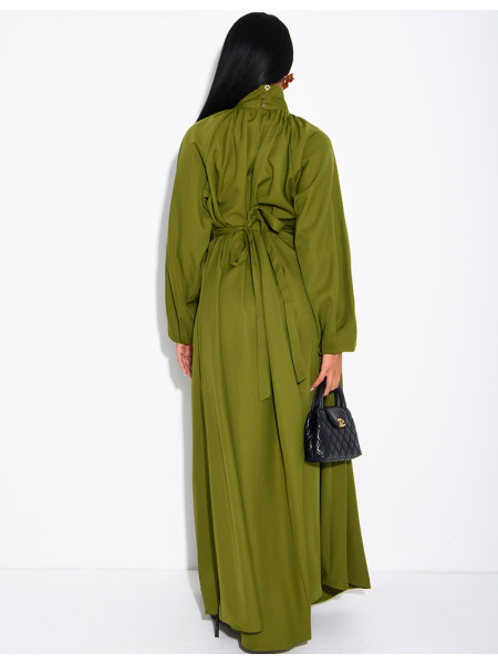 Long dress with a high neck and a wide belt at the waist