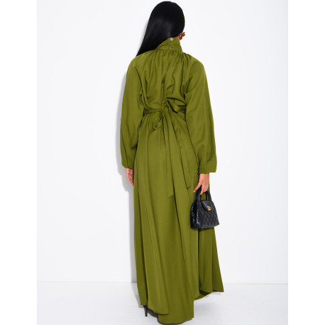 Long dress with a high neck and a wide belt at the waist