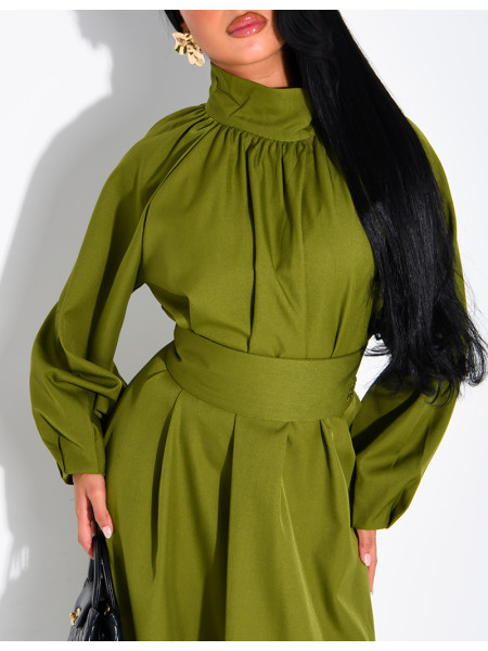 Long dress with a high neck and a wide belt at the waist