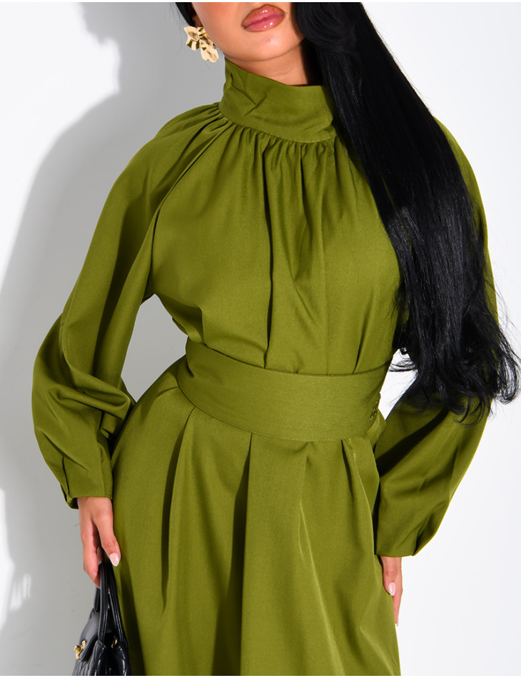 Long dress with a high neck and a wide belt at the waist