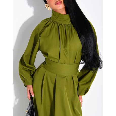 Long dress with a high neck and a wide belt at the waist