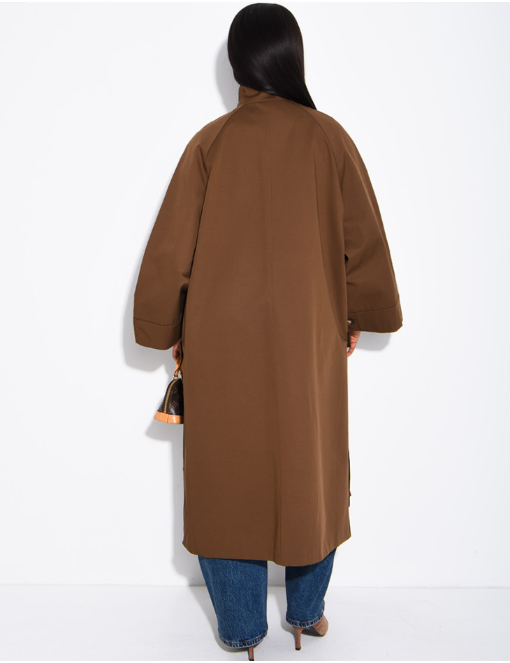 Oversized trench coat with a stand-up collar and side slits