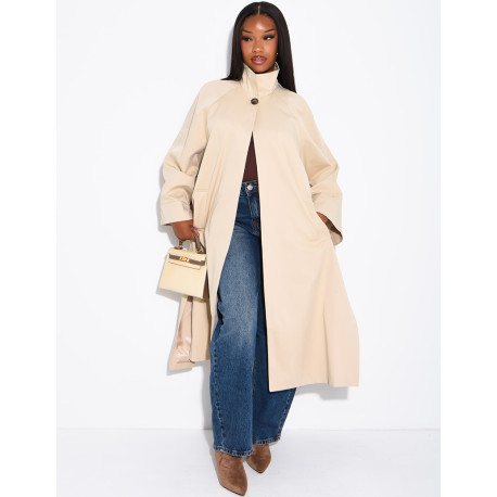 Oversized trench coat with a stand-up collar and side slits