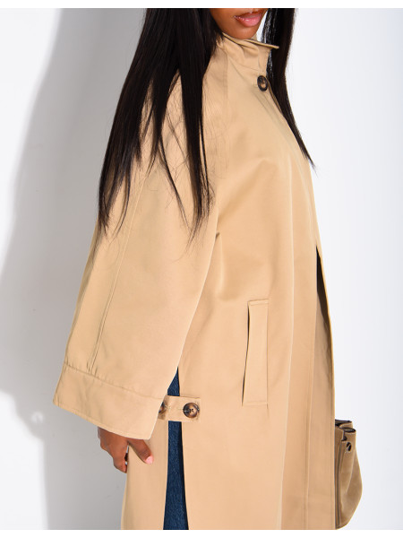 Oversized trench coat with a stand-up collar and side slits