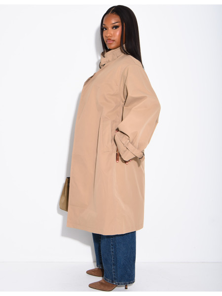 Long, oversized trench coat with a stand-up collar and straps
