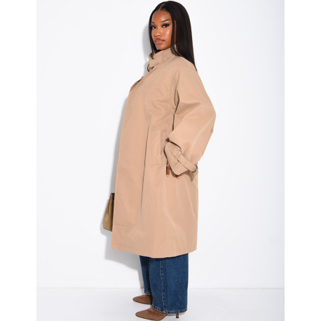 Long, oversized trench coat with a stand-up collar and straps