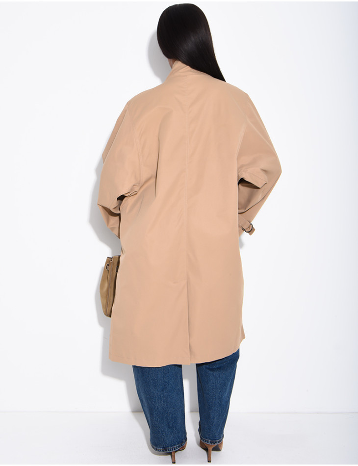 Long, oversized trench coat with a stand-up collar and straps
