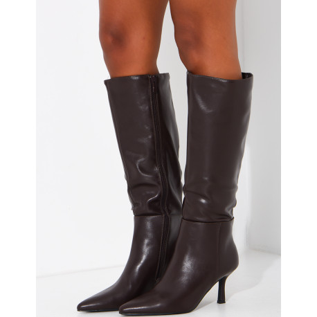 Faux leather boots with heels and pointed toes