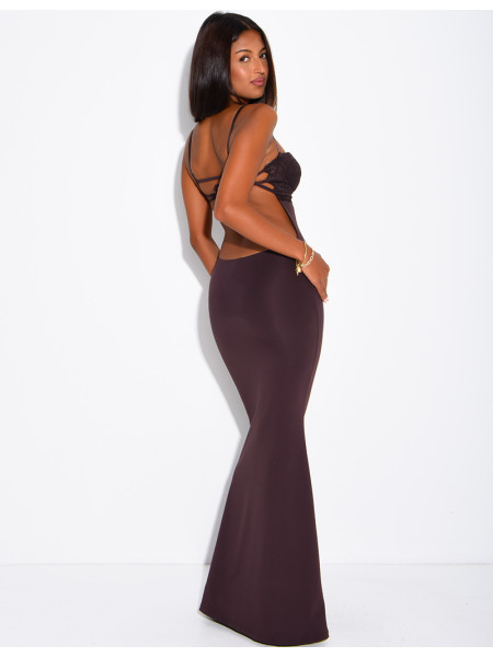 Long, form-fitting backless dress with lace