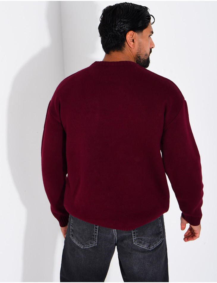 Pull en maille avec broderie lettre C