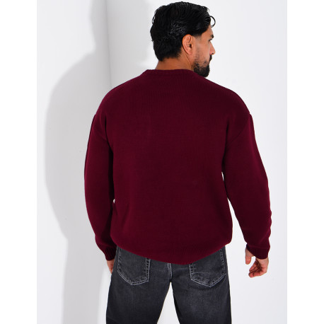 Pull en maille avec broderie lettre C