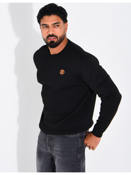 Pull avec lettre H