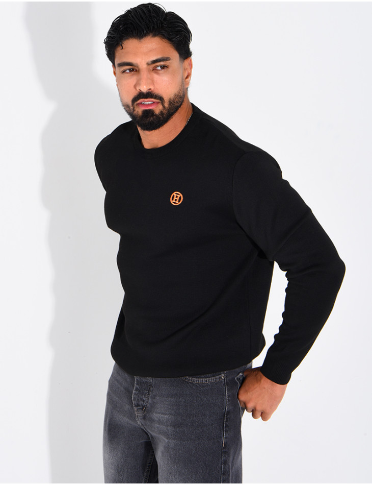 Pull avec lettre H