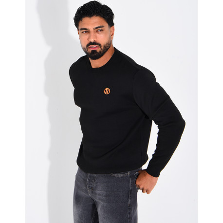 Pull avec lettre H