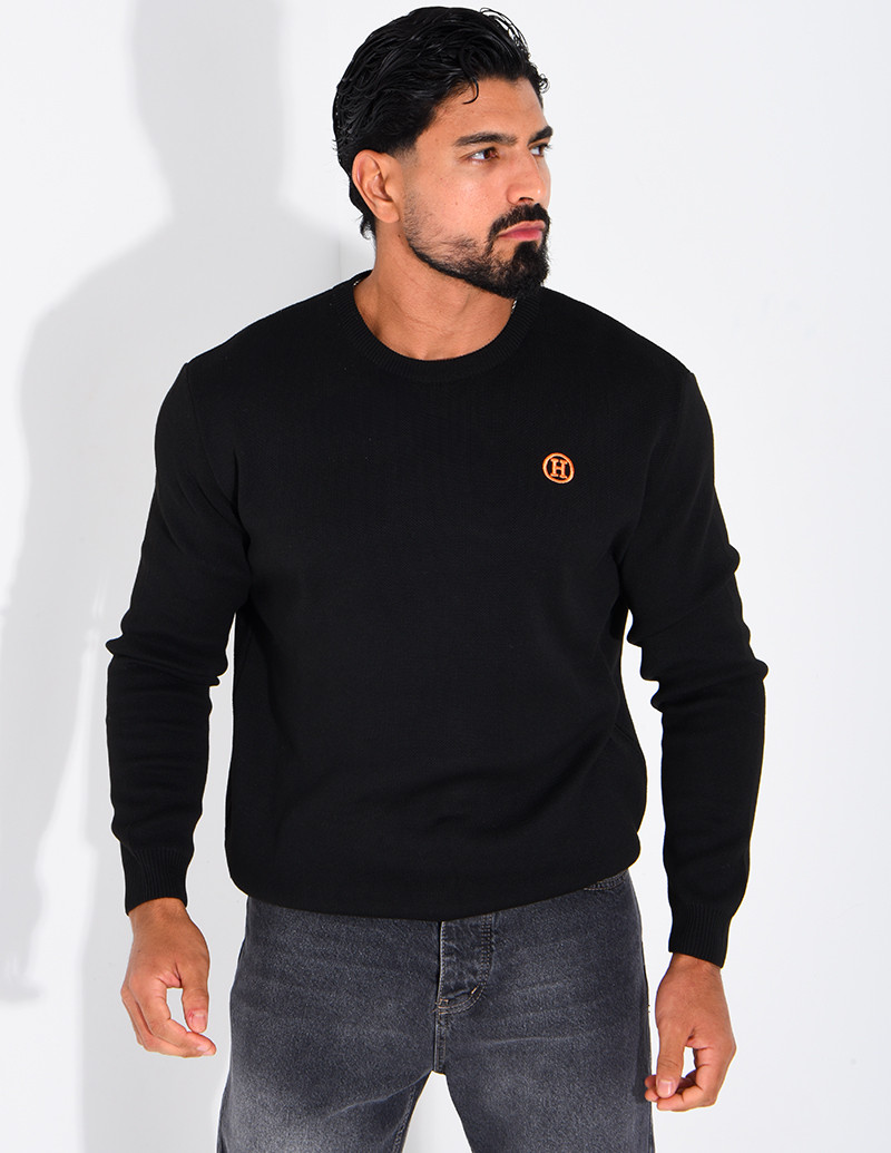 Pull avec lettre H