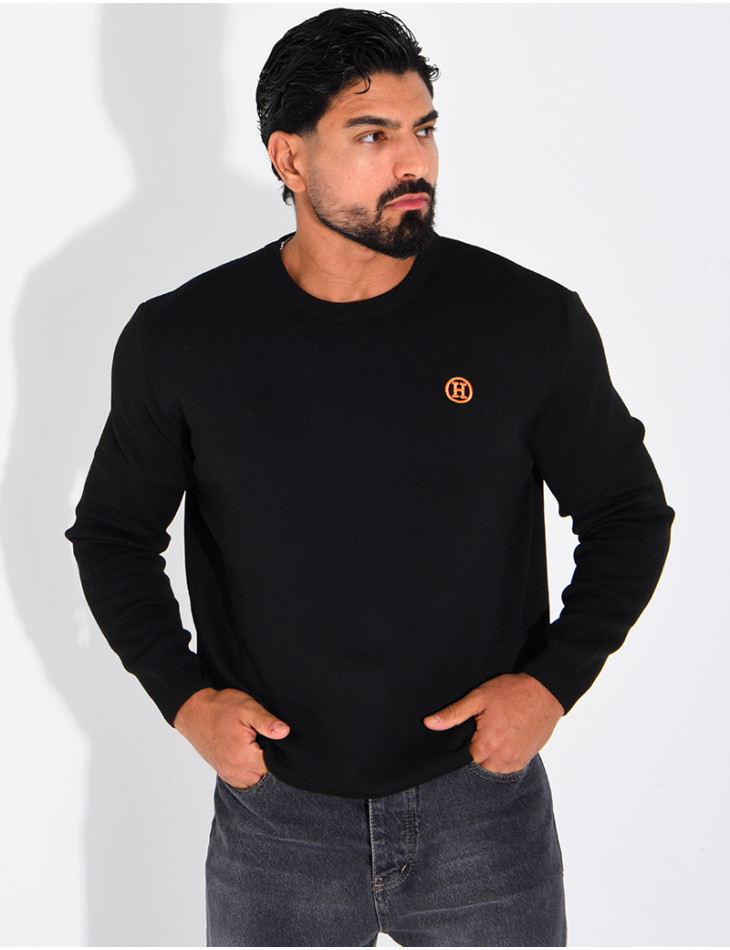 Pull avec lettre H