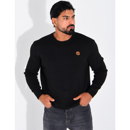 Pull avec lettre H