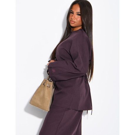 Long-sleeved top with a tie at the back