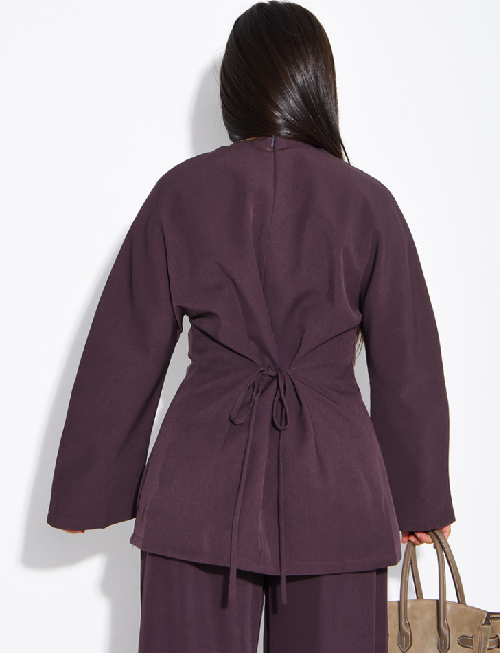 Long-sleeved top with a tie at the back